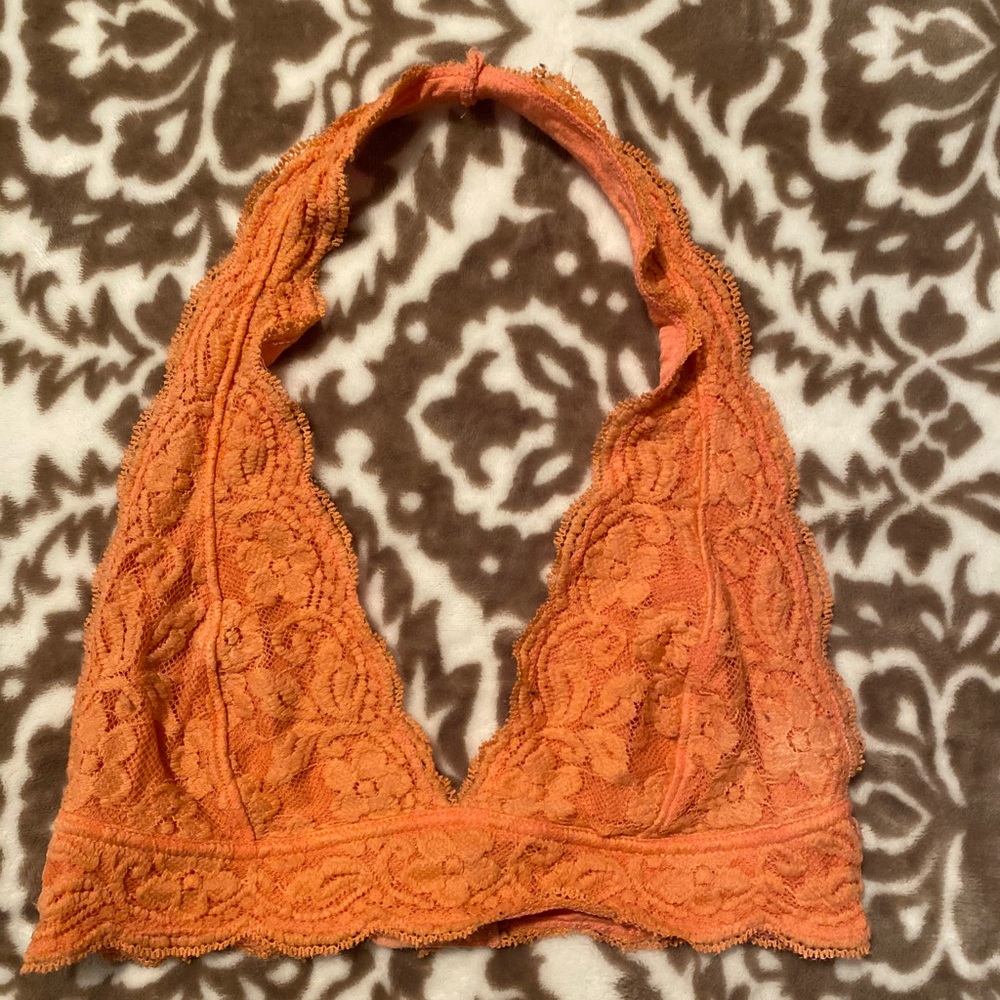 Orange lace bralette from Urban Outfitters
